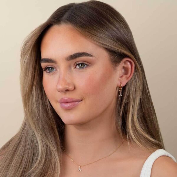 Model Wears Blair Medium Hoops Lab Grown Diamond Kaya Marquise 3 Stone Earring Charm Yellow Gold Pendant Cropped