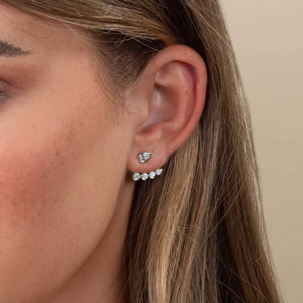 Model Wears Diamond Thalia Tapered Curved Bar Earring Enhancer With Athena Pear Bezel Studs White Gold Cropped