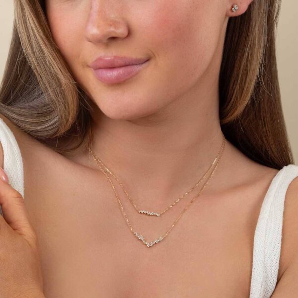 Model Wears Diamond Vanessa V Shape Cluster Necklace Chiara Bar Layered Necklace Yellow Gold Ginger Cluster Studs Cropped