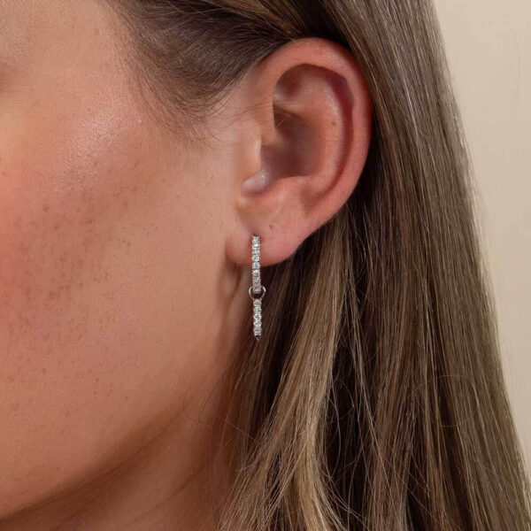 Model Wears Lab Grown Diamond Gemma Small Pointed Bar Earring Enhancer With Erica 1.5 Large White Gold Hoops Cropped