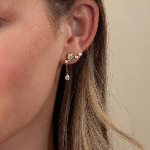 Model Wears Lab Grown Diamond Gia Round Bezel Drop Ear Climber Anna Yellow Gold Studs Cropped