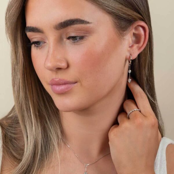 Model Wears White Gold Joanna Pear Bezel Two Stone Drop Diamond Earring Enhancer With Blair Large Plain Hoops