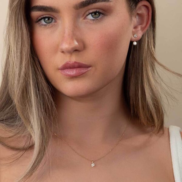 Model Wears Yellow Gold Anna Round Studs Luna Round Medium Earring Enhancer Lou Round Large Bezel Diamond Pendant Cropped